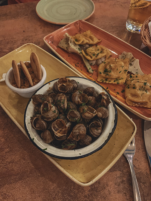 Eat like a local - try rabbit ravioli, snails, and horse meat - Malta