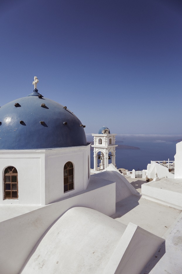 Typical Santorini colors - the white church with a blue dome